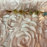 Metal Tone Cuff Bracelet featuring a Clover