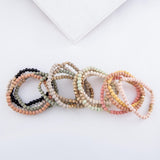 Four Beaded Bracelets with Gold Accents